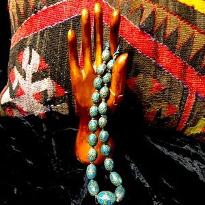 Turquoise tribal silver inlaid beads.